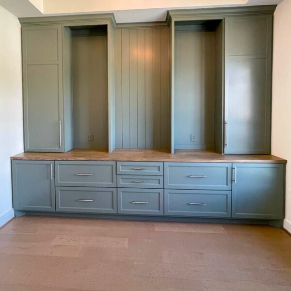 Custom cabinets painted green by The Woodlands Premier Remodeling